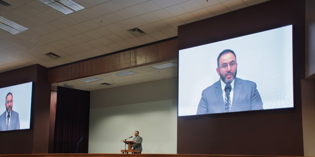 business tycoon at podium