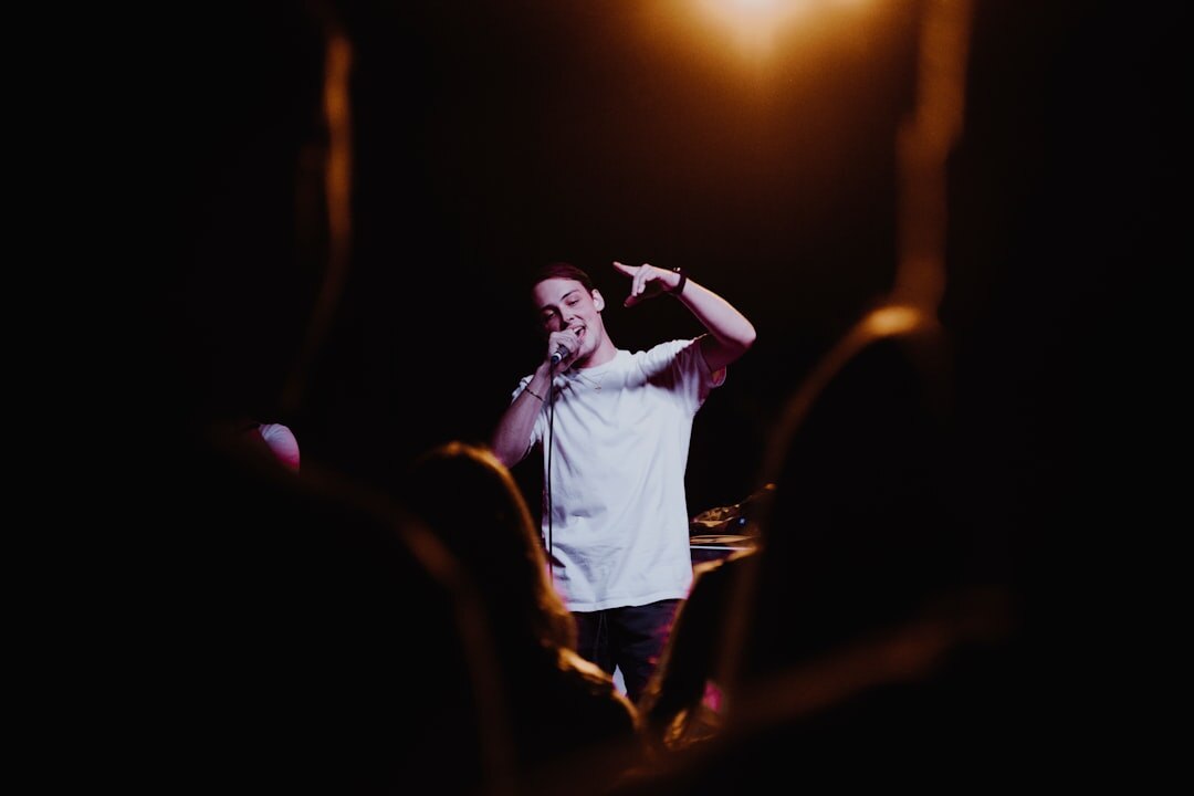 comedian performing on stage